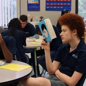 These high schoolers are reading Wonder! This is an amazing book about overcoming adversity, fri